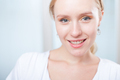 closeup portrait of a cute happy young woman smiling - PhotoDune Item for Sale