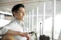 Young man waiting in airport lounge - PhotoDune Item for Sale