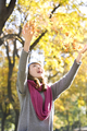 Young Woman Throwing Maple Leaves into the Air - PhotoDune Item for Sale