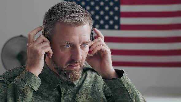 Army Officer in Headphones Talking alt