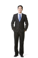 Young businessman laughing with hands in pocket - PhotoDune Item for Sale