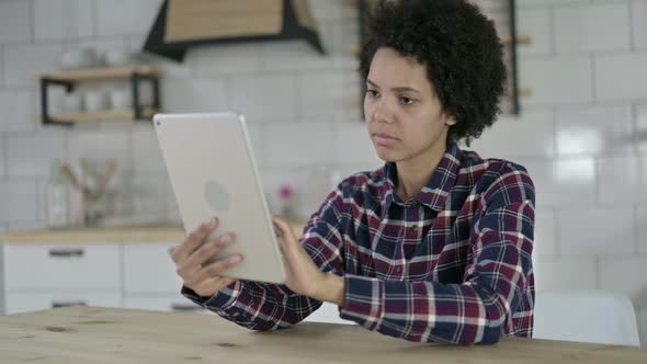 Upset African American Woman Get Shocked on Tablet