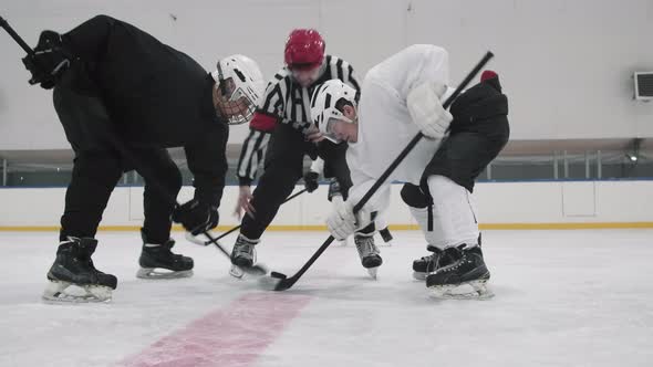 Face-Off At Ice Arena During Hockey Game