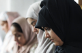 Muslim women praying in Tashahhud posture - PhotoDune Item for Sale