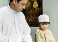 Muslim boy learning how to Salah - PhotoDune Item for Sale