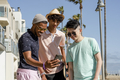Social media share, teen boys watching viral content - PhotoDune Item for Sale