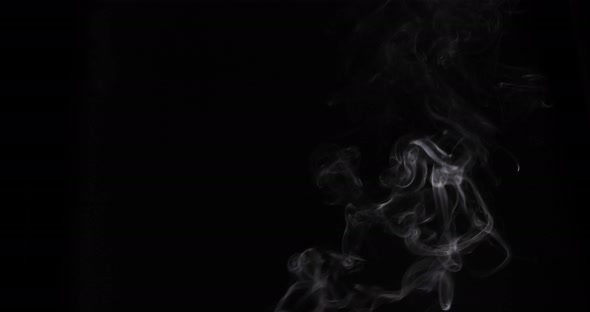 Smoke VFX Video Element isolated on black background. Great for compositing into your project