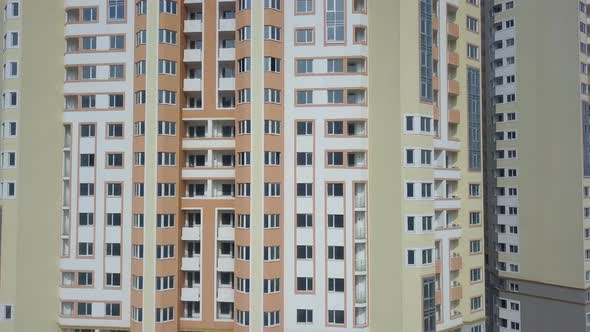 Each of these windows has their stories,From behind of each one, somebody looks at the river.