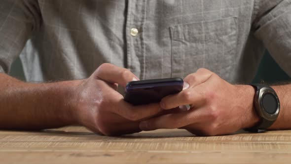 Caucasian man using his phone