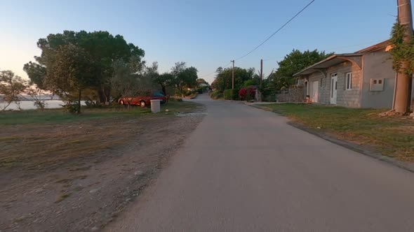 MC Plate Driving in Rural Village, Croatia, Holiday Exploring