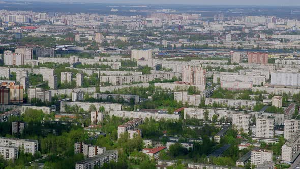 A View From a Helicopter Flying Over an Urban Area on Sunny Summer Day