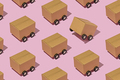 Isometric pattern with cardboard boxes on wheels as trucks carry parcels and make deliveries. - PhotoDune Item for Sale