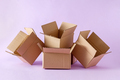 Pile of open cardboard boxes for storing and shipping items and parcels. - PhotoDune Item for Sale
