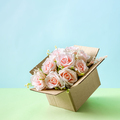 Flowers in a cardboard box for delivery or wedding congratulations or as a gift or surprise. - PhotoDune Item for Sale