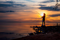 Woman fishing on Fishing rod spinning in Finland - PhotoDune Item for Sale