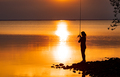 Woman fishing on Fishing rod spinning in Finland - PhotoDune Item for Sale