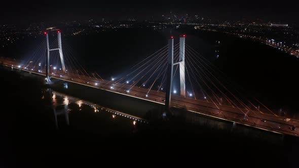 Aerial View Traffic on City Bridge Road at Night Roadway in Modern Big City in Evening