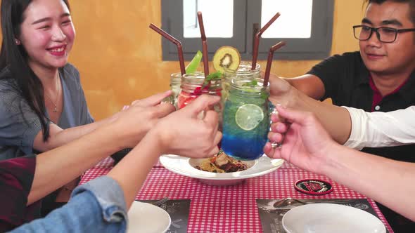 Group Of Friends Hands Cheering With Coffee And Tropical Fruits Cocktails