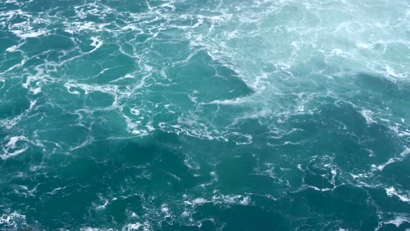 Shot of a Beautiful White Foam on the Surface of the Water