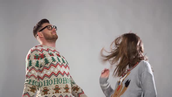 Happy Couple Dancing at Christmas Party