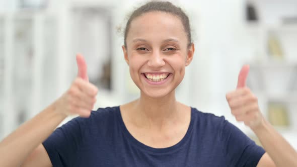 Portrait of Positive African Woman Doing Thumbs Up 