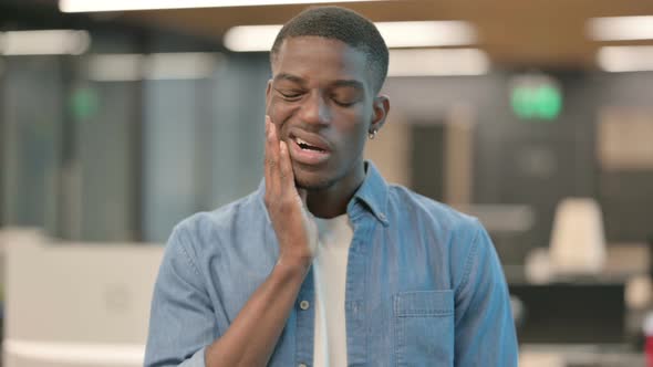 Young African American Man Having Toothache Cavity