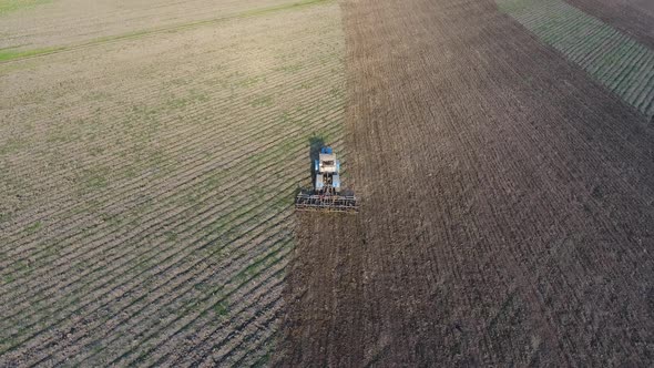 Top View of the Tractor That Plows the Field. Disking the Soil. Soil Cultivation After Harvest