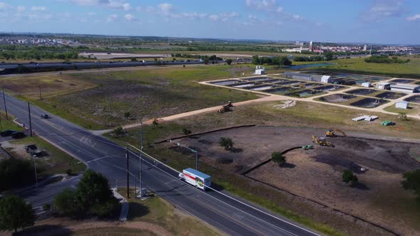 Flying over a developing community out in the country.