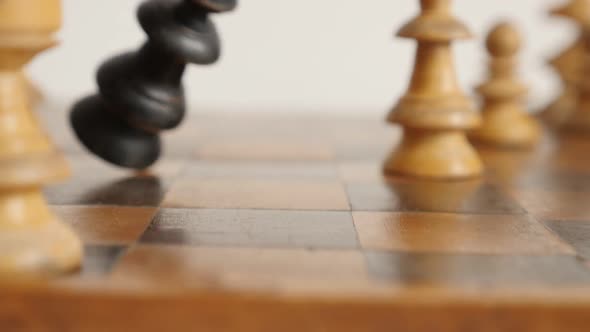 Old wooden chess set figures end of game slow-mo shallow DOF 1920X1080 HD footage - Black player kin