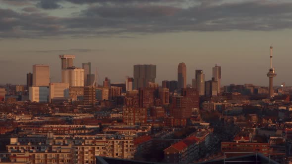 Close-up shot of skyline of Rotterdam, the Netherlands at sunset on a sunny winter day