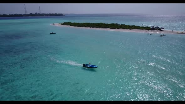 Aerial tourism of paradise resort beach time by shallow ocean and white sandy background of a dayout