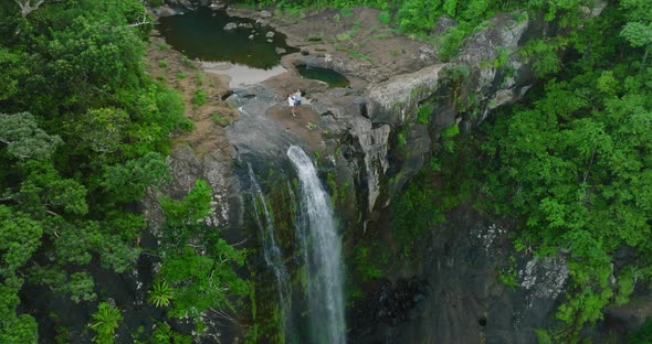 Big Family at the Top of a Big Waterfall