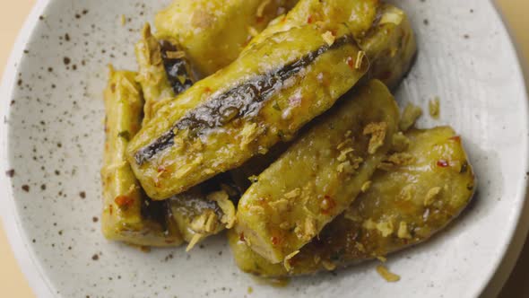 Top View of Tempura Aubergine Slices with Spicy Spices and Cane Sugar Syrup