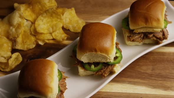 Rotating Shot of Delicious Pulled Pork Sliders