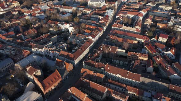 AERIAL: Kaunas Oldtown with Beautiful Golden Hour Light on Medieval Houses