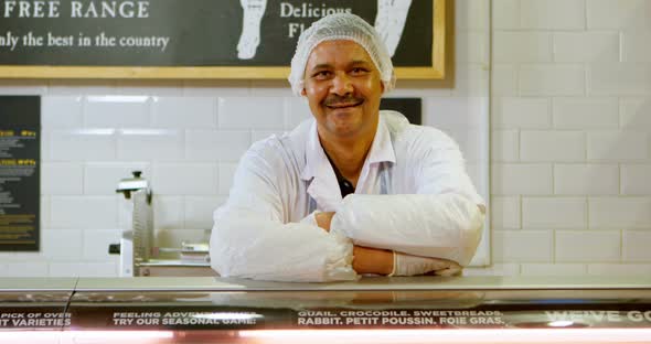 Smiling Butcher Standing in Shop 4k