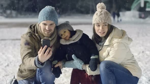 Family Selfies at Skating Rink 