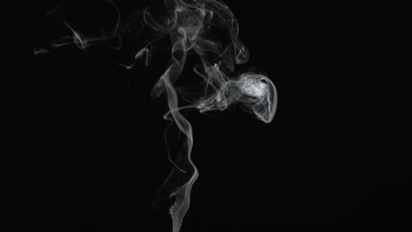 Smoke on black background in slow motion; shot on Phantom Flex 4K at 1000 fps alt