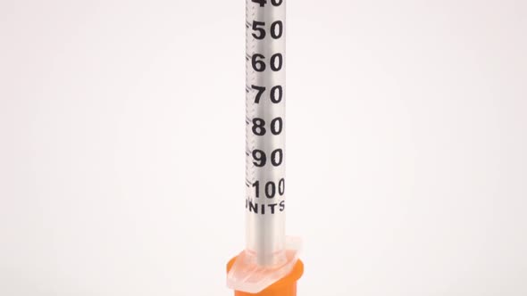 Insulin Medical Syringe on White, Close Up