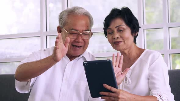 Asian elderly couple spending time together at home.