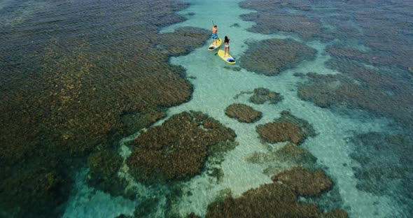 Couple Stand Up Paddling