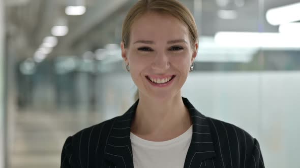 Attractive Young Businesswoman Saying No By Head Shake