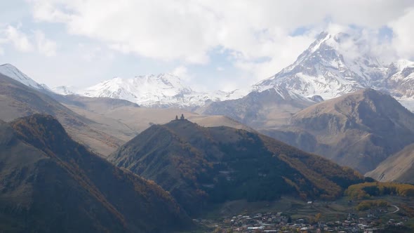 Mountain Kazbek Mkinvartsveri and Town Stepantsminda Autumn Colors of Georgia