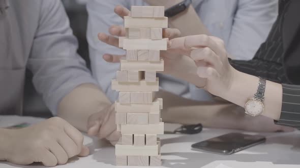 Group of Unrecognizable Millennial Caucasian Friends Playing Jenga