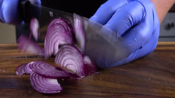 The Cook Cuts Onions 