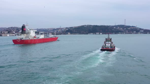 Istanbul Bosphorus Lpg Cargo Ship Floating With Security Escort Aerial View