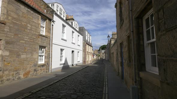 Narrow street with cobblestone pavement