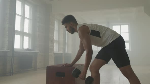 Strong Man Working Out With Dumbbell