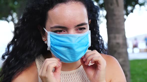 Portrait of a Young Student Woman Wearing a Protective Mask on the Street, Wearing a Ovid-19 Mask