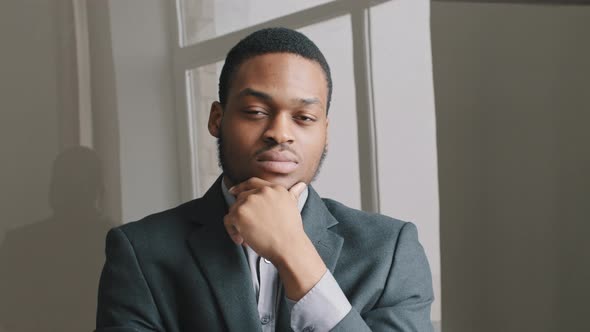 Close Up Young Pensive Serious African American Man Student Office Worker Concerned About Problem or